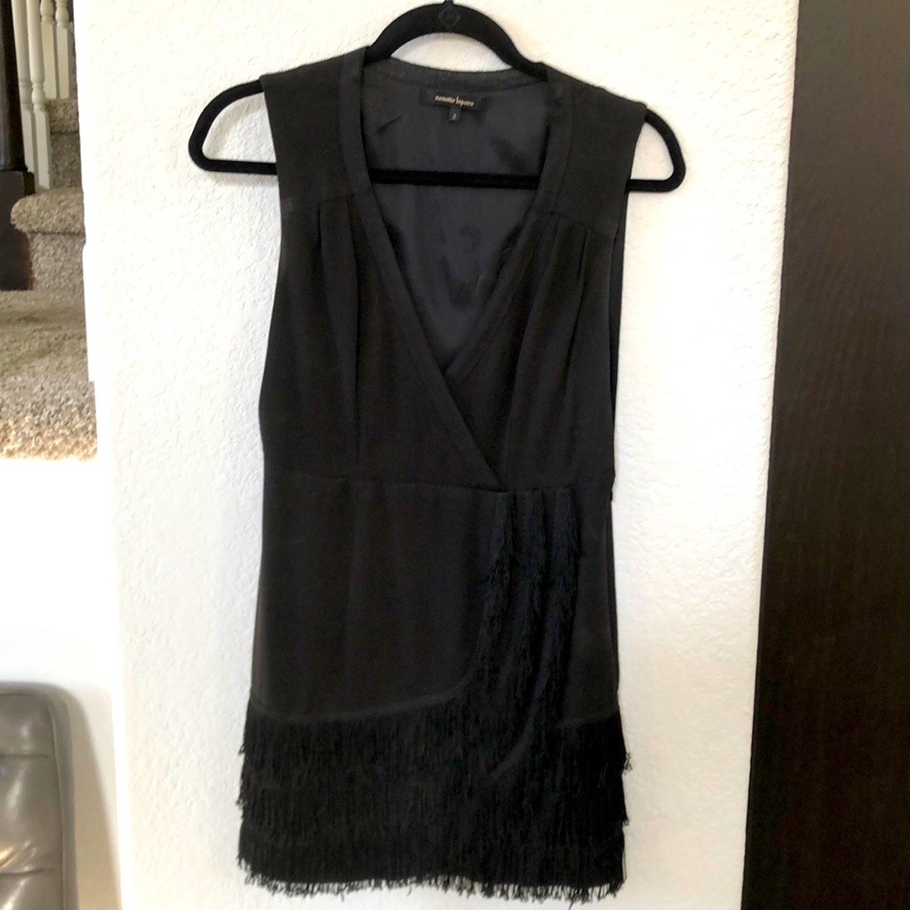 Nanette lepore little black dress, with fringe on the bottom.